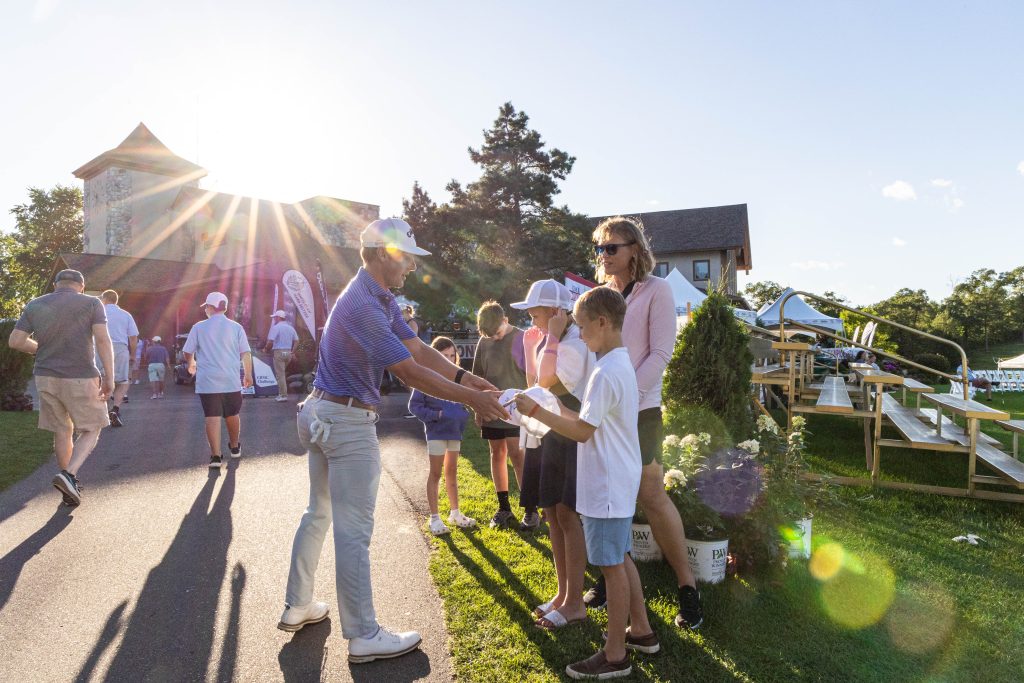 Kids getting autographs from PGA TOUR Americas Players at CRMC Championship at Cragun's Legacy Courses in Brainerd, MN